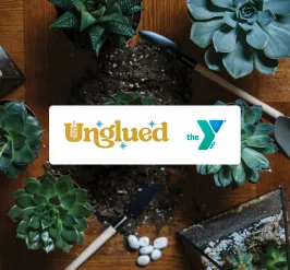 Image of Unglued logo and YMCA logo. Background image of several succulent plants and a terrarium on a wooden table